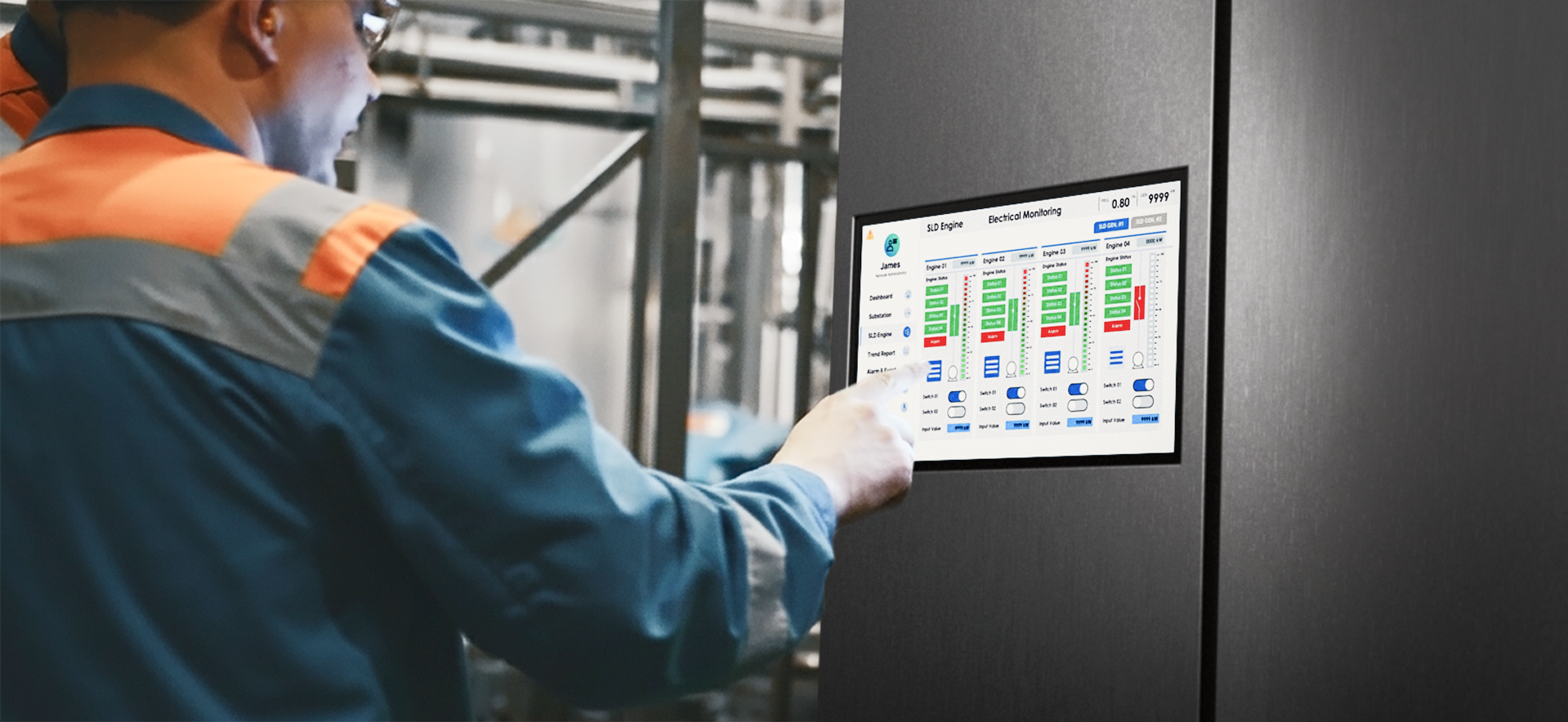 Industrial worker operating a connected touchscreen interface on factory automation equipment to monitor production systems.